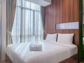 Modern and Comfort Studio Room Apartment at Capitol Park Residence By Travelio